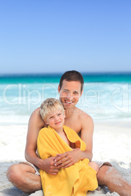 Father with his son in his towel