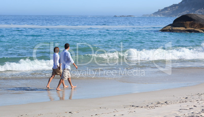 Couple walking on the beach