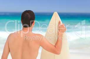Man with his surfboard
