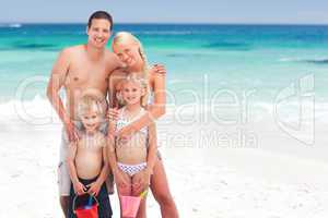 Radiant family on the beach