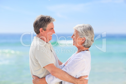 Elderly man embracing her wife