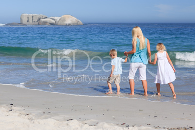 Family walking on the beach