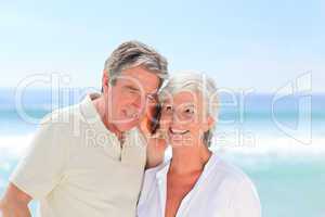 Retired couple listening to their shell