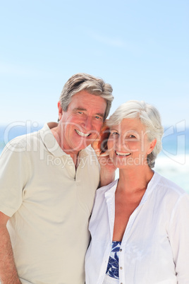 Retired couple listening to their shell