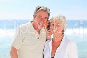 Retired couple listening to their shell