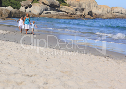 Family walking on the beach