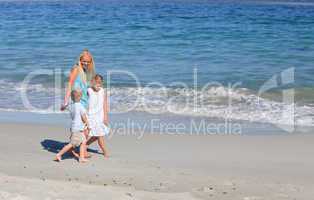 Family walking on the beach