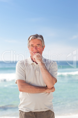Pensif man on the beach