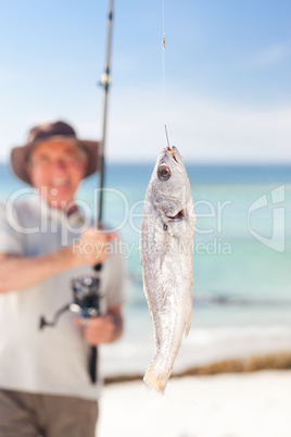 Man fishing at the beach