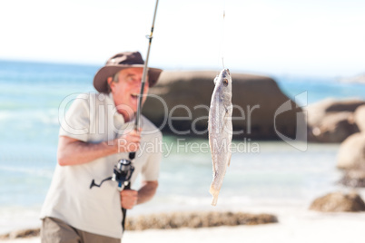 Man fishing at the beach