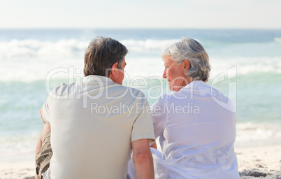 Senior couple looking at the sea Senior couple looking at the sea