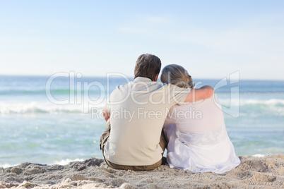 Senior couple looking at the sea