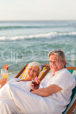 Retired couple drinking a cocktail