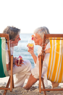 Senior couple drinking a cocktail