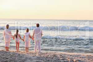 Portrait of a family beside the sea