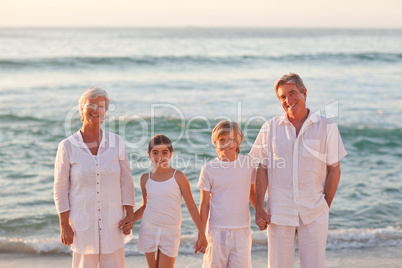 Portrait of a family beside the sea