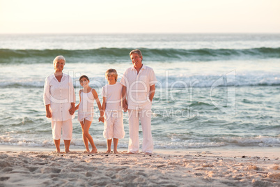 Portrait of a family beside the sea