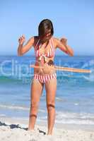 Woman playing with a hula hoop