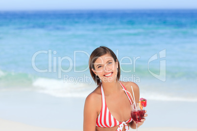 Lovely woman drinking a cocktail