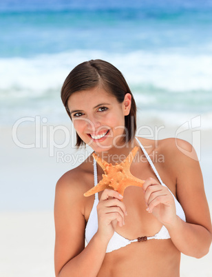 Lovely woman with a starfish