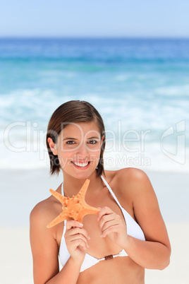 Lovely woman with a starfish