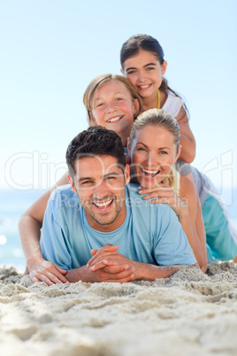 Portrait of a smiling famiy at the beach
