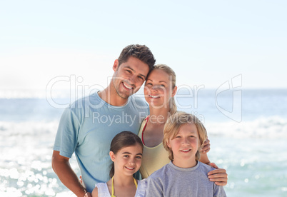 Joyful family at the beach