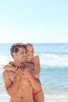 Happy lovers at the beach