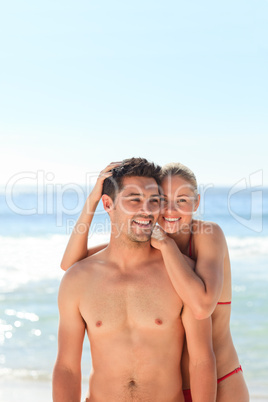 Enamored couple at the beach