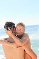 Enamored couple at the beach