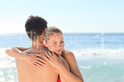 Enamored couple at the beach