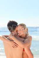 Enamored couple at the beach