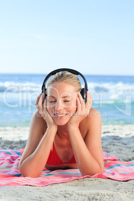 Radiant woman listening to some music