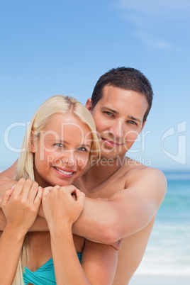 Enamored couple on the beach