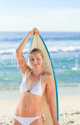 Sexy woman with her surfboard