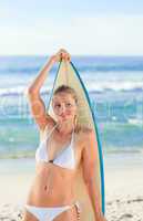 Sexy woman with her surfboard