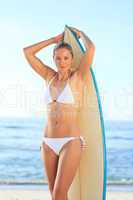 Sexy woman with her surfboard