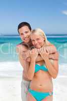 Enamored couple on the beach