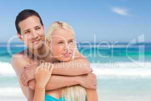 Enamored couple on the beach