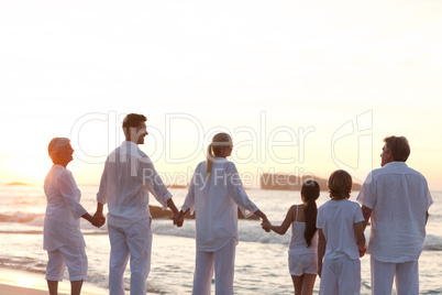 Family at the beach during the sunset