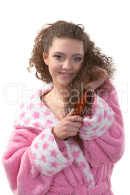 Teenager  in a pink dressing gown