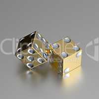 Golden right handed casino dice with silver eyes