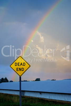 DEAD END sign with rainbow