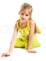 Little girl sitting on the floor