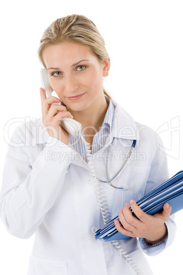 Young female doctor on the phone