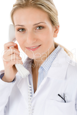 Smiling female doctor on the phone