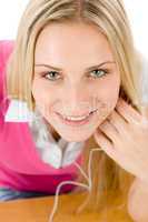 Cheerful student woman listen to music