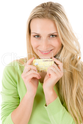 Home shopping - young woman holding credit card