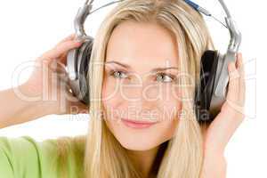 Young woman with headphones listen to music