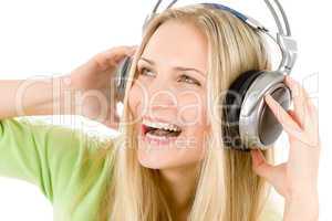 Cheerful woman with headphones listen to music
